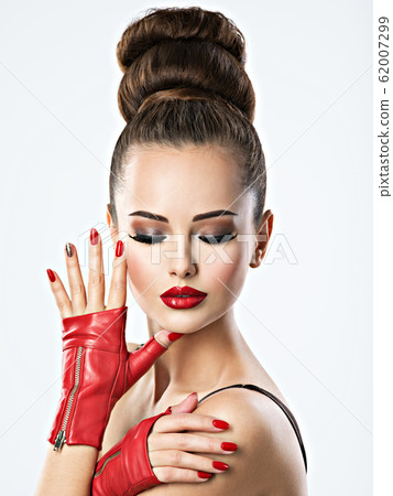 Beautiful sensual woman with red nails Beautiful sensual woman with red nails 62007299