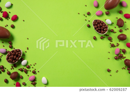 Egg hunt is coming. Easter traditions, chocolate eggs, top view 62009287
