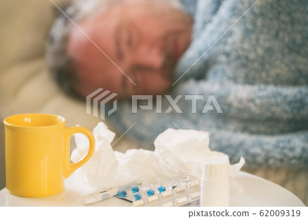 Mature man suffering from coronavirus, flu or cold Mature man suffering from coronavirus, flu or cold 62009319
