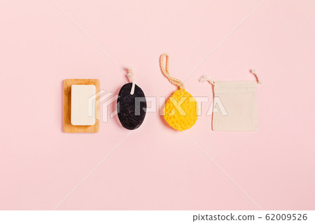 Zero waste accessories on pink background. 62009526