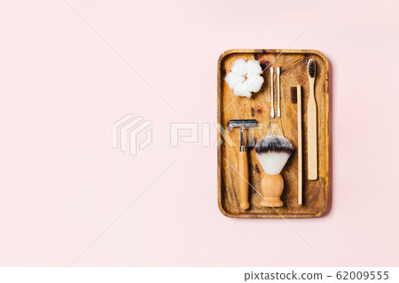 Zero waste accessories on pink background. 62009555