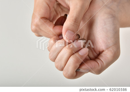 Nails fungal and bacteria infection from dirty manicure salon tools 62010386