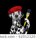 Dalmatian dog as a painter with a brush. Isolated on black 62012120