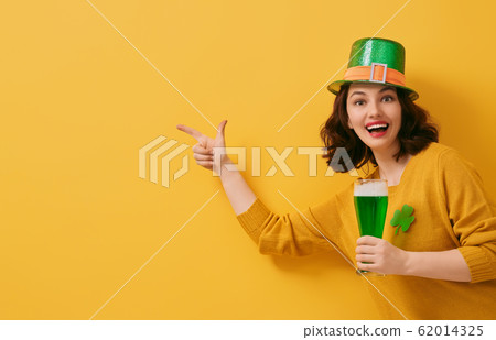 woman in leprechaun hat 62014325