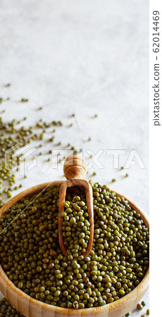 Dried mung beans with a spoon Dried mung beans with a spoon 62014469