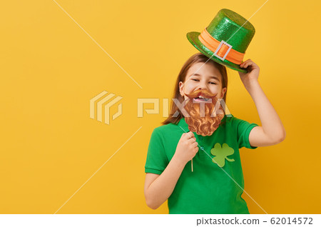 girl in leprechaun hat 62014572