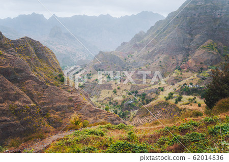 Vertiginous trekking trails leading between mountain hills down to the Coculi valley. Santo Antao Island, Cape Verde 62014836
