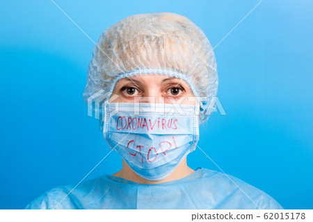 Portrait of sick woman wearing medical uniform and 62015178