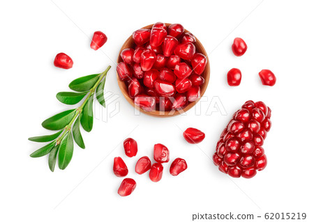 pomegranate seeds in wooden bowl isolated on white background with clipping path and full depth of field. Top view. Flat lay. 62015219