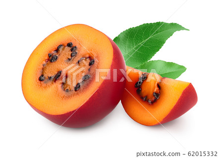 Fresh tamarillo fruit half with leaf isolated on white background Fresh tamarillo fruit half with leaf isolated on white background 62015332
