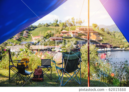 The tent of the tourist at camping near lake, Concept of Camping Relaxing 62015888