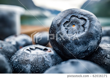 Blueberry antioxidants on a wooden table on a 62016171