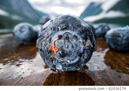 Blueberry antioxidants on a wooden table on a 62016174