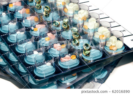 Pills in blisters for every day of the week for the morning, day, night time. Medications for patients in a hospital 62016890