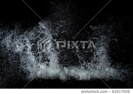 Splashing wave on the Black sea in the night. 62017008