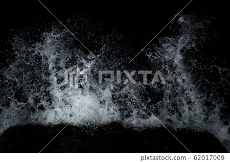 Splashing wave on the Black sea in the night. 62017009