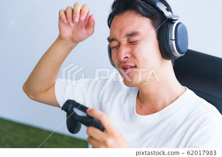 eSports pro gamer youth occupation game controller failure defeat disappointment disappointment person japanese eSports pro gamer youth occupation game controller failure defeat disappointment disappointment person japanese 62017983