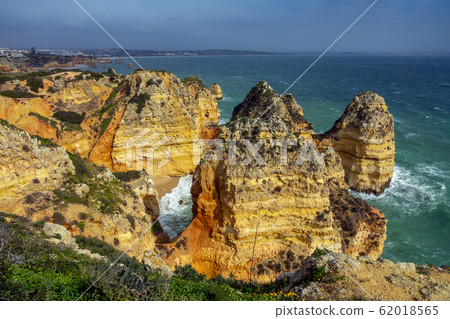 Rock cliffs and waves in Portugal Rock cliffs and waves in Portugal 62018565