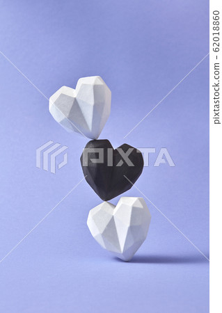 Vertical pillar from plaster black and white hearts. Vertical pillar from plaster black and white hearts. 62018860