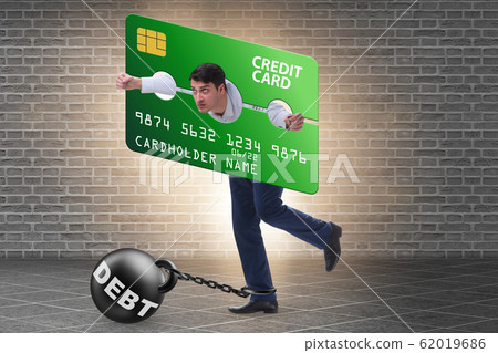 Businessman in credit card burden concept in pillory Businessman in credit card burden concept in pillory 62019686
