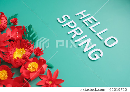 Hello, spring. With red paper flowers and green 62019720