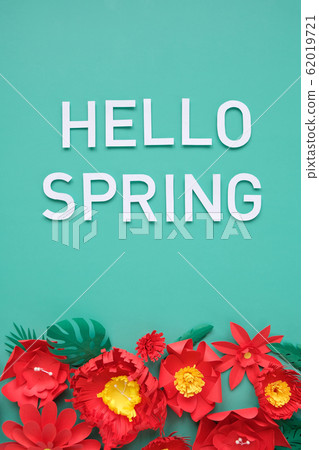 Hello, spring. With red paper flowers and green 62019721