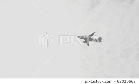 The Commercial passenger airplane flying overhead 62020662