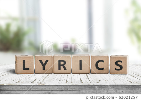 Lyrics sign on a table in a bright room 62021257