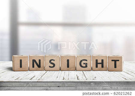 Sign with the word insight in a bright office Sign with the word insight in a bright office 62021262