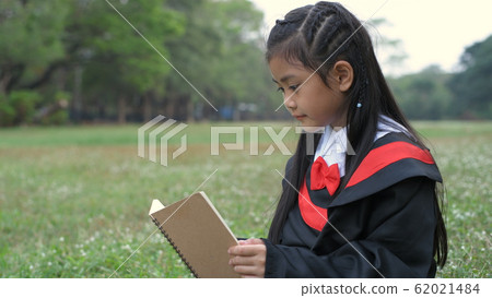 Educational concepts. The girl wearing the Educational concepts. The girl wearing the 62021484