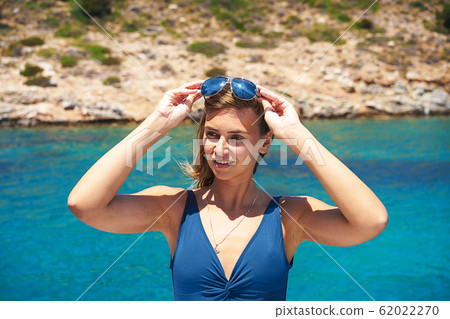 Caucasian female model in fashion sunglasses. 62022270