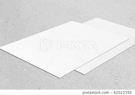 two empty white rectangle poster mockup lying 62022592