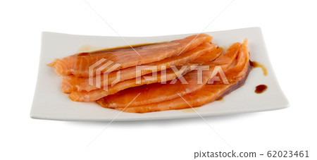 Thin Slices of Raw Salmon Fillet Isolated on White Thin Slices of Raw Salmon Fillet Isolated on White 62023461
