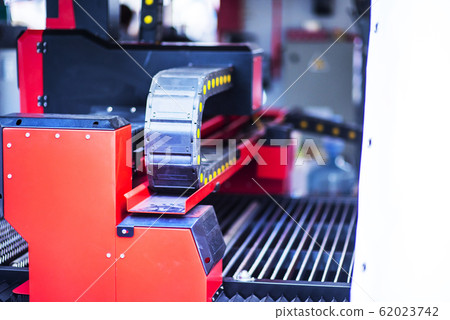 Sheet of metal and hands of worker who works on Sheet of metal and hands of worker who works on 62023742