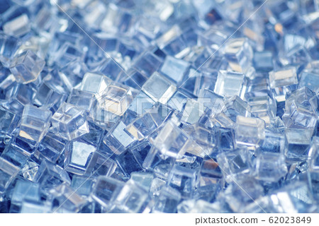 Blue and shiny ice cubes, cold background Blue and shiny ice cubes, cold background 62023849