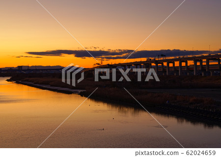 Enjoy a sunset view of Adachi Kodai from Nishiarai Bridge over Arakawa 62024659