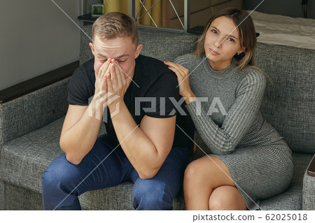 Young man with not getting enough sleep and girl. Young man with not getting enough sleep and girl. 62025018