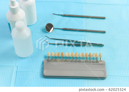 Close-up Dental Instruments. Against the background of the dental clinic 62025324