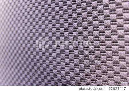 Light purple background of dense woven bagging fabric, closeup. Structure of the cloth with natural texture. Cloth backdrop. Light purple background of dense woven bagging fabric, closeup. Structure of the cloth with natural texture. Cloth backdrop. 62025447