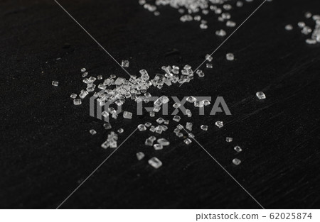 Big Sugar Crystals or Sucrose Crystals on Black 62025874