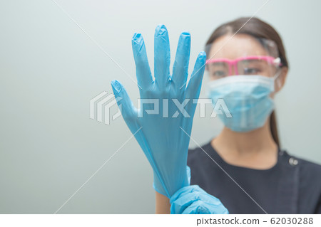Healthcare, medicine and people concept. Female or Male doctor working in hospital 380 62030288