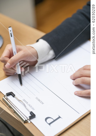 Healthcare, medicine and people concept. Female or Male doctor working in hospital 502 62030289