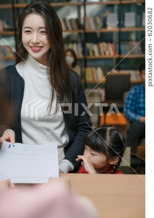 Healthcare, medicine and people concept. Female or Male doctor working in hospital 016 62030682