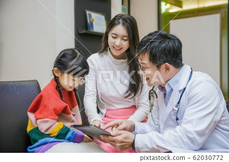 Healthcare, medicine and people concept. Female or Male doctor working in hospital 035 Healthcare, medicine and people concept. Female or Male doctor working in hospital 035 62030772