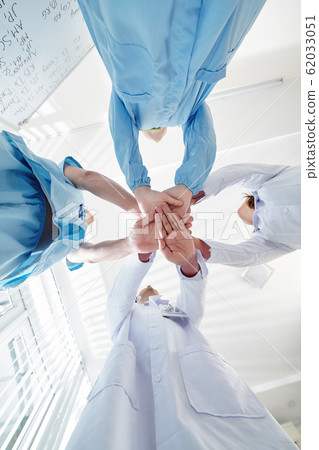Pulmonology department stacking hands 62033051