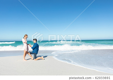 Marriage proposal at the beach Marriage proposal at the beach 62033691