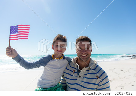 Father and son at the beach Father and son at the beach 62034032