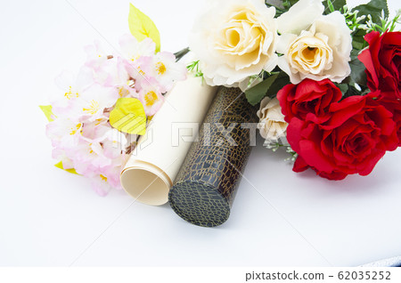 Diploma and flower (artificial flower) Diploma and flower (artificial flower) 62035252