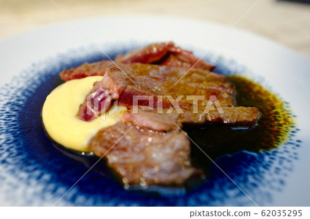 Delicious meal fashionable french cuisine Delicious meal fashionable french cuisine 62035295