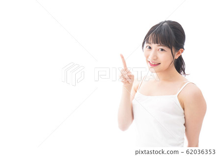 Smiling young woman doing a duty at home 62036353